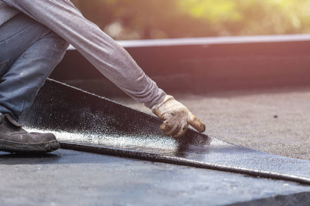 Professional Waterproofing technician working in Holton, MI
